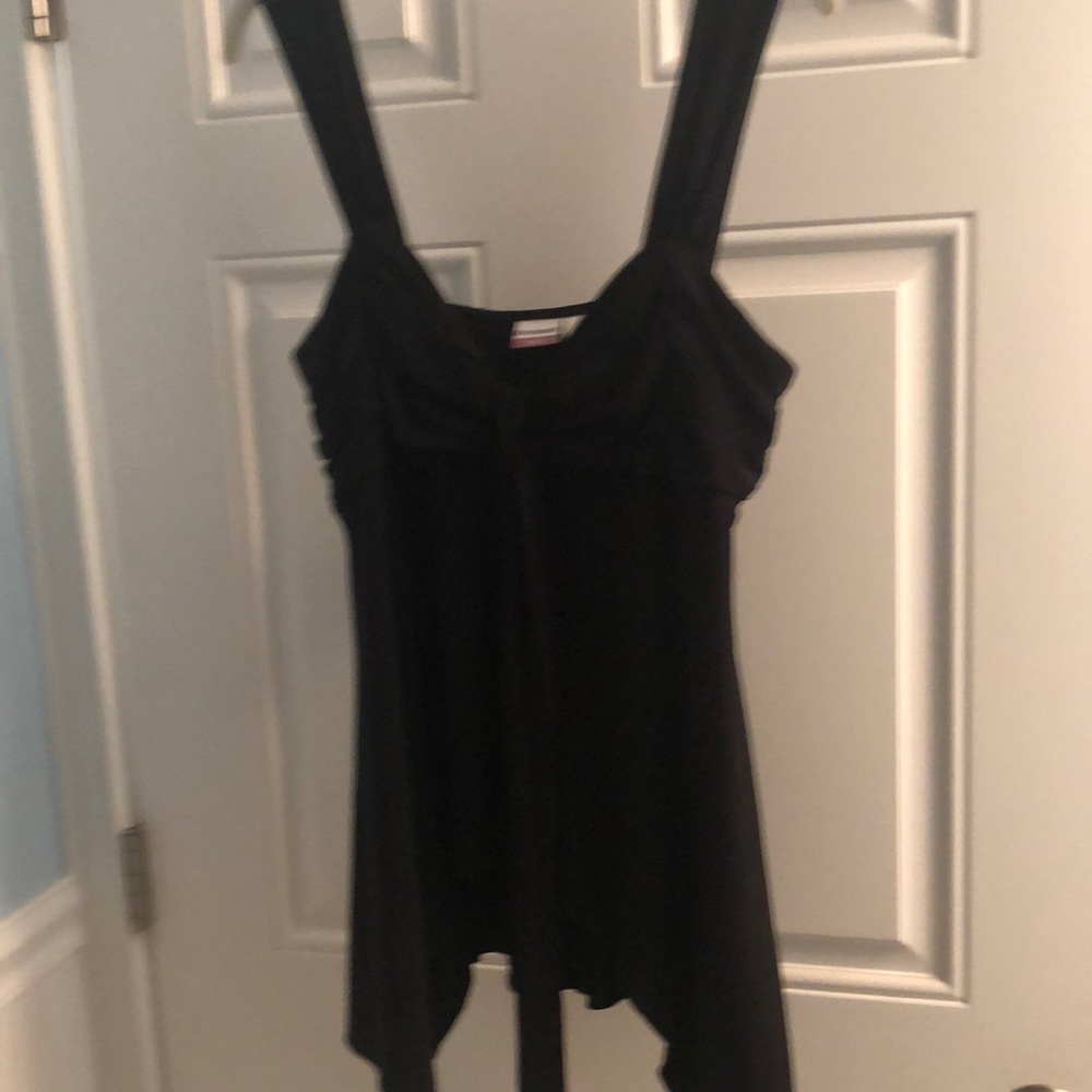 Black stretchy sexy top-however, it does run small in the chest.